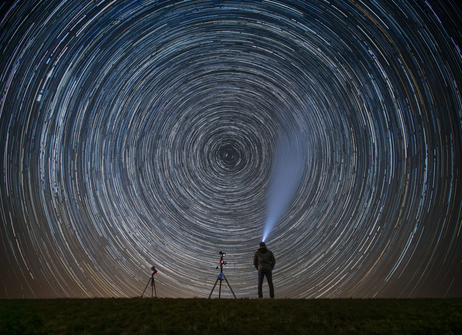 Telescope set against a starry sky
